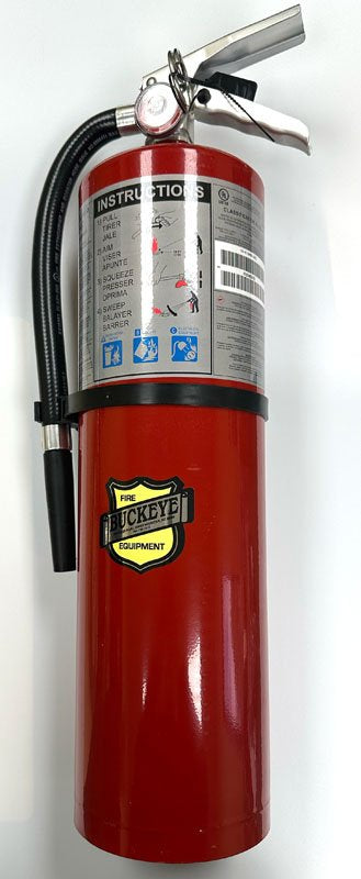 A red fire extinguisher with a visible label and a hose attached.